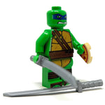 Custom Leo Blue Fighter Turtle LEGO minifigure by B3 Customs featuring a detailed turtle-themed design with blue armor and accessories.