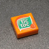 Custom printed LEGO Tic Toc 1x1 tile by B3 Customs featuring a detailed Tic Toc design on a small LEGO brick.