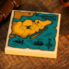 Custom printed Blackbeard's Treasure Map 2x2 tile from B3 Customs featuring a detailed city scene inspired by pirate lore.