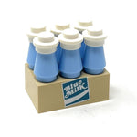 Six-pack of custom LEGO blue milk bottles from B3 Customs, featuring vibrant blue color and detailed LEGO branding.