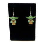 B3 Customs Baby Yoda (Grogu) earrings made from LEGO bricks, featuring detailed LEGO-style miniature Grogu figures on earrings.