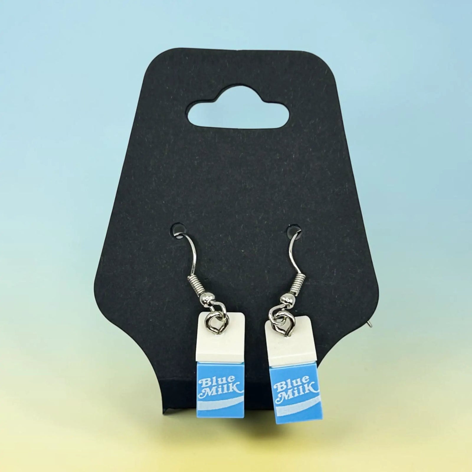 Blue milk brick earrings by B3 Customs featuring vibrant blue brick design and silver hooks on a white background.