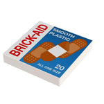 Custom LEGO Brick-Aid first aid tile by B3 Customs, featuring a 2x2 LEGO brick design resembling a bandage on a white background.