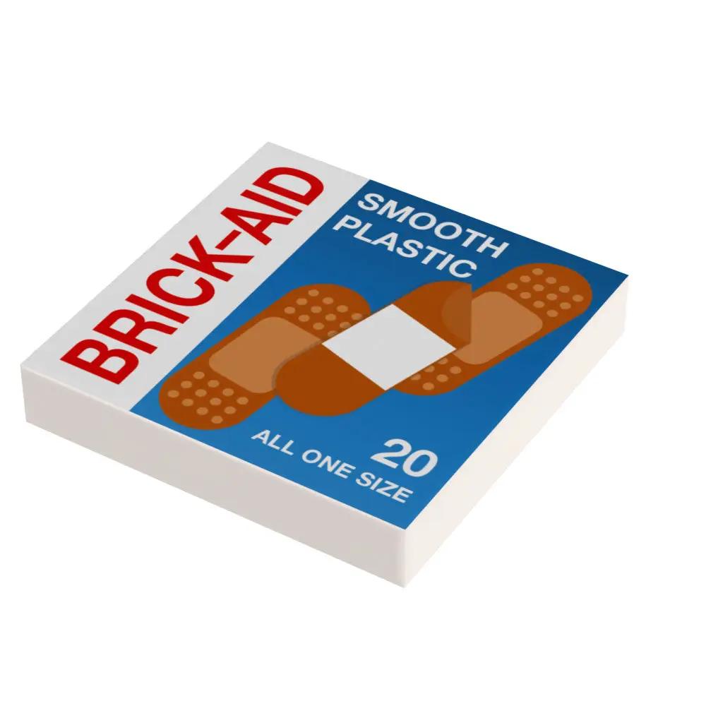 Custom LEGO Brick-Aid first aid tile by B3 Customs, featuring a 2x2 LEGO brick design resembling a bandage on a white background.