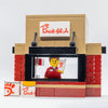 LEGO Chick-Fil-A food stand set with B3 Customs employee minifig, featuring a detailed brick-built fast food restaurant scene.