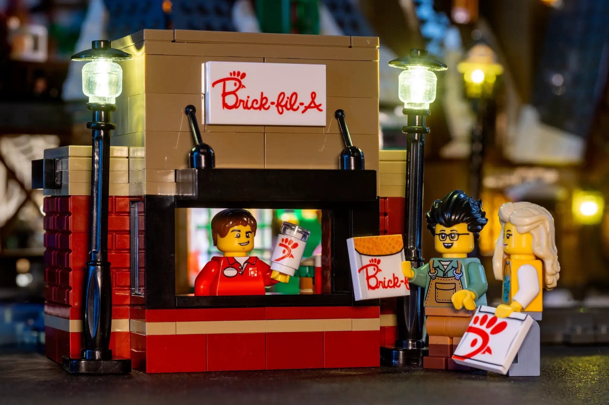 Brick-Fil-A food stand with B3 Customs employee minifig, detailed LEGO-style restaurant scene with food service setup.