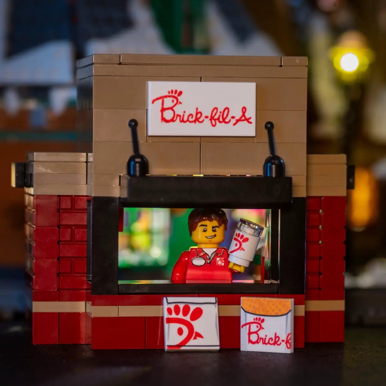 LEGO Chick-Fil-A food stand with employee minifigure, detailed B3 Customs brick-built restaurant scene for kids and collectors.