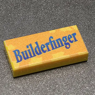 Builderfinger Printed 1x2 Candy Tile by B3 Customs, showing colorful Lego-style brick with printed candy pattern on a neutral background.