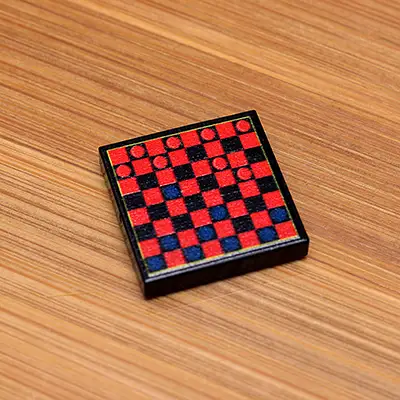 Checkers printed 2x2 LEGO tile from B3 Customs, featuring detailed checkerboard pattern and vibrant colors.