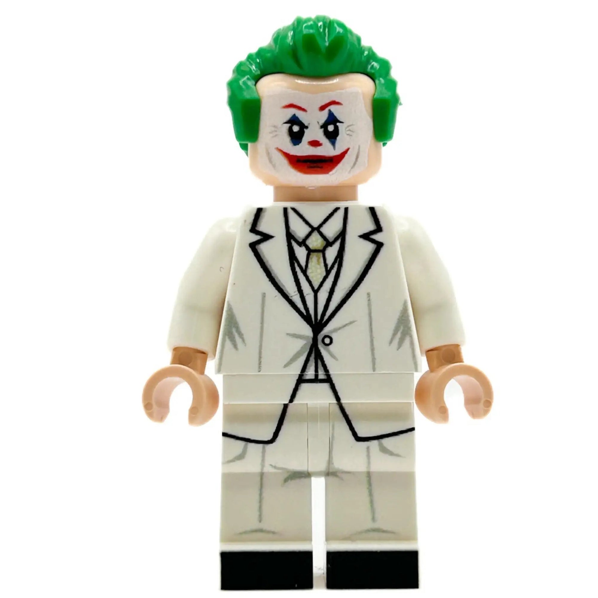 Custom Joker Minifigure made with LEGO parts by B3 Customs, featuring a green suit, purple hair, and iconic Joker accessories.