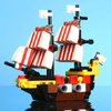 Custom Mini Black Seas Barracuda LEGO ship with Captain Brickbeard minifigure by B3 Customs, detailed pirate vessel with sails and mast.