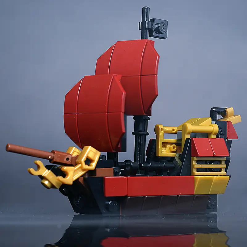Custom LEGO mini Queen Anne's Revenge pirate ship by B3 Customs, featuring detailed sails and intricate ship design.