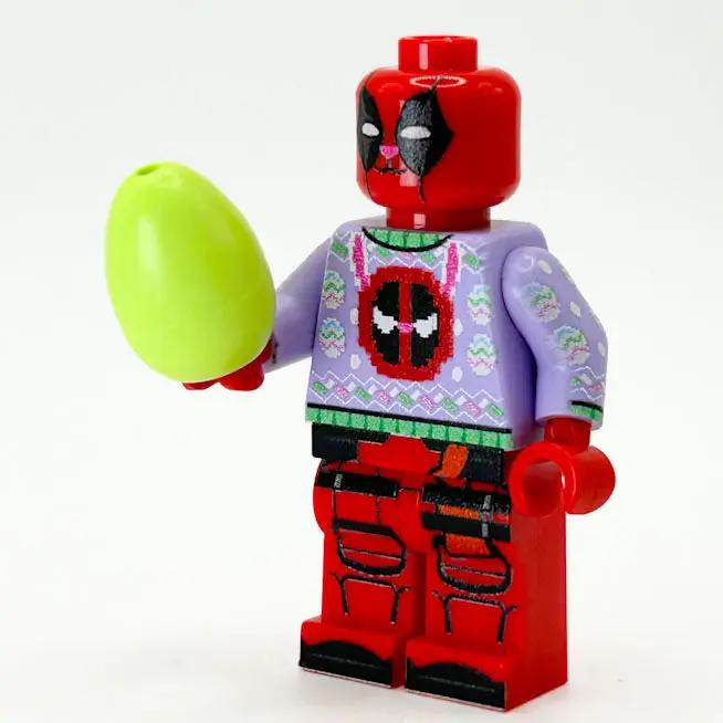 Easterpool Minifig crafted with LEGO parts by B3 Customs, featuring colorful Easter-themed accessories and detailed construction.