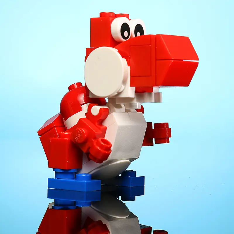 Custom red LEGO dinosaur figure named Friendly Red Dino by B3 Customs, made with colorful LEGO bricks and parts.