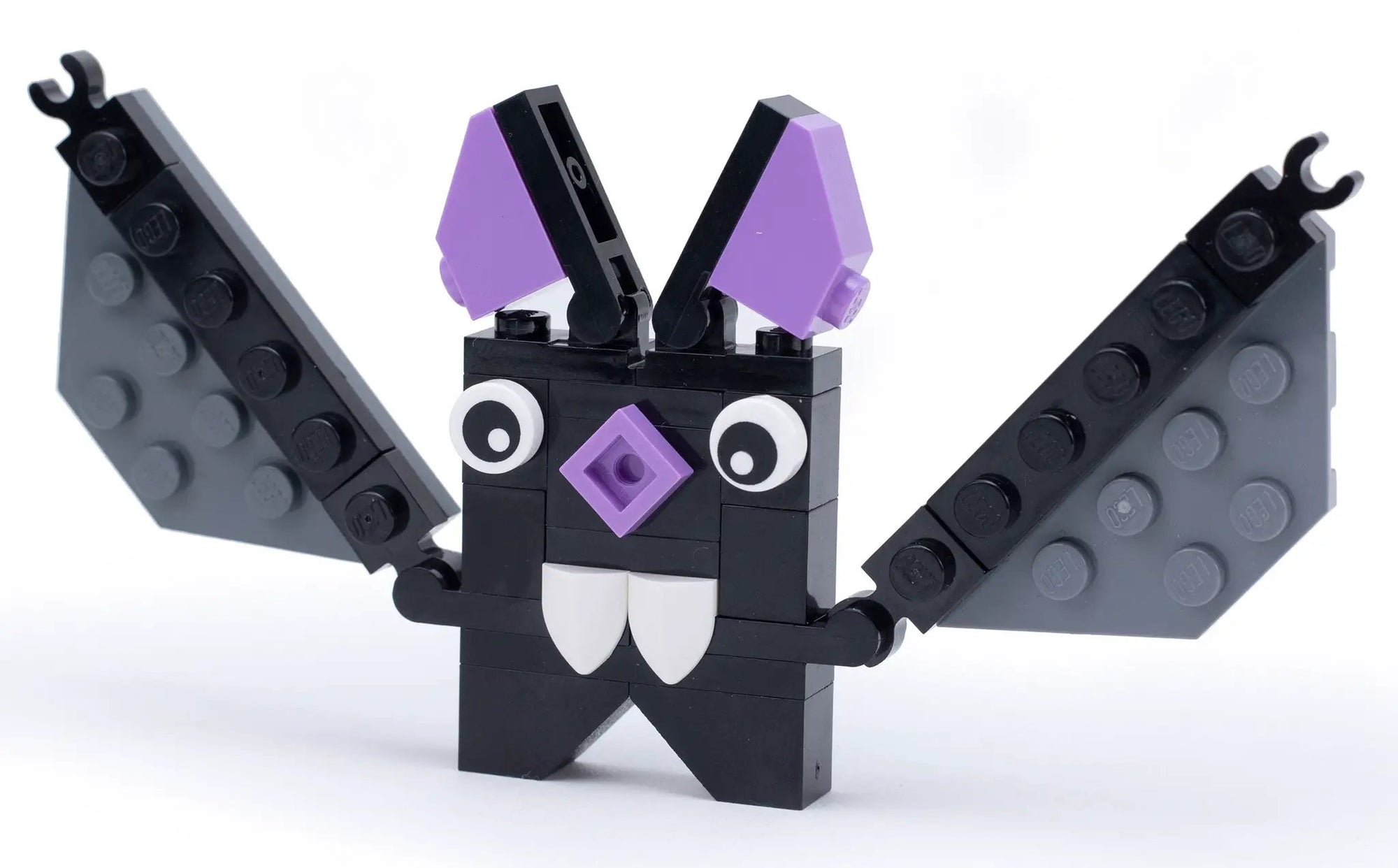 LEGO Halloween bat made with B3 Customs custom LEGO parts, featuring black wings and detailed brick construction.