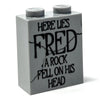 Here Lies Fred Halloween tombstone made of 1x2x2 brick by B3 Customs, featuring a humorous skull and crossbones design.