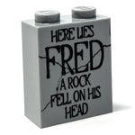 Here Lies Fred Halloween tombstone made of 1x2x2 brick by B3 Customs, featuring a humorous skull and crossbones design.