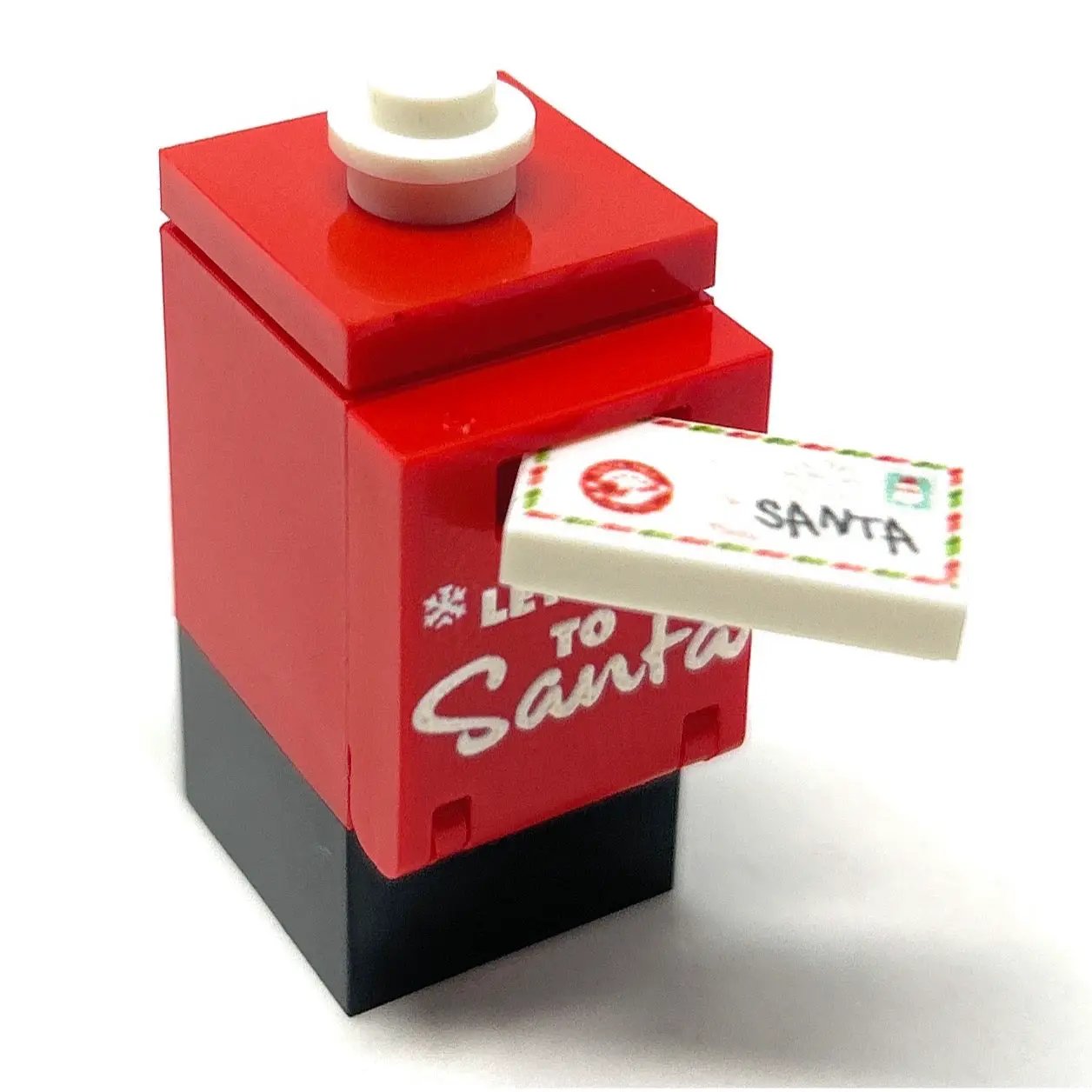 LEGO Santa letter mailbox and envelope set by B3 Customs, featuring colorful brick design and festive holiday theme.