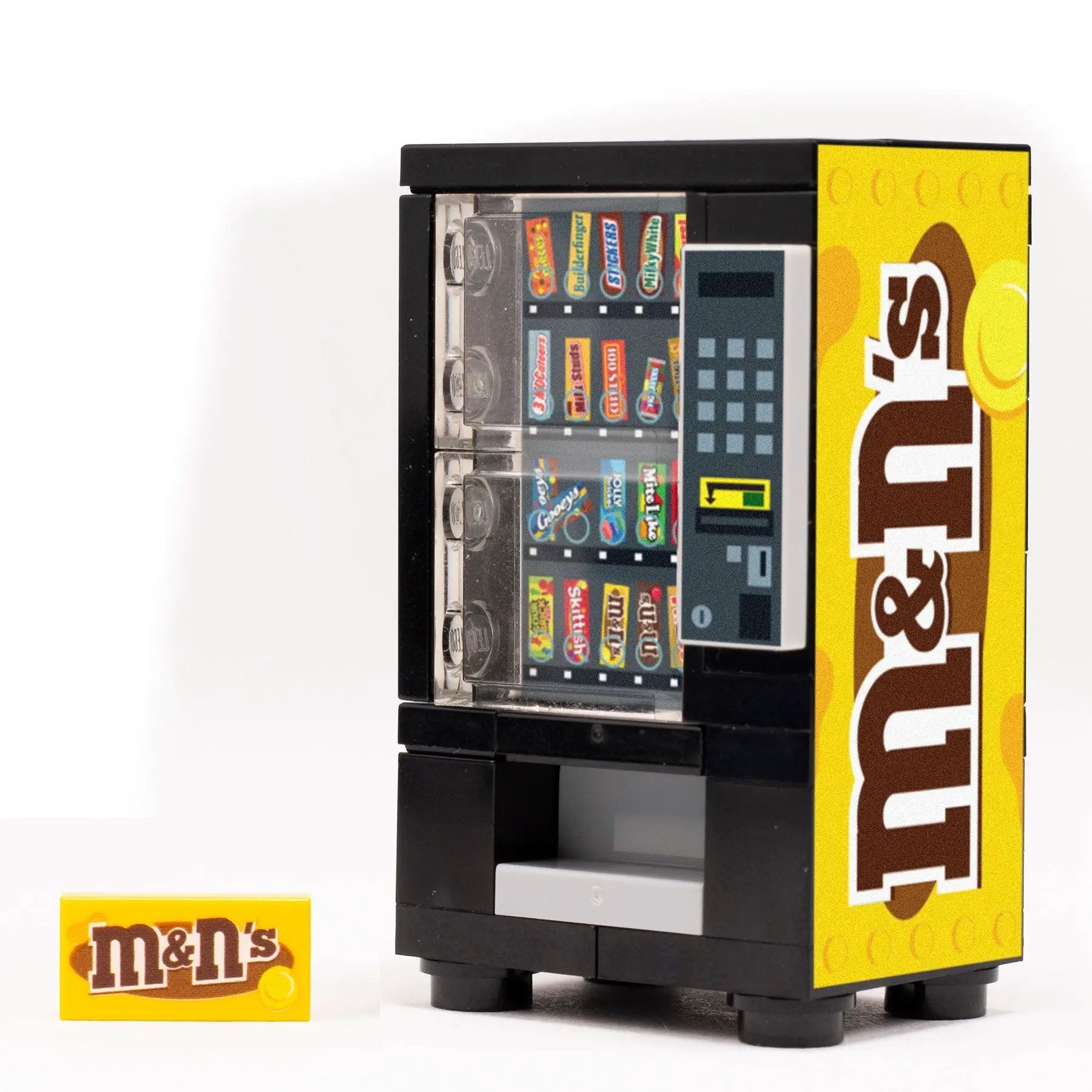 LEGO M&Ns Peanut Candy Vending Machine built by B3 Customs, detailed LEGO brick model with vending components.