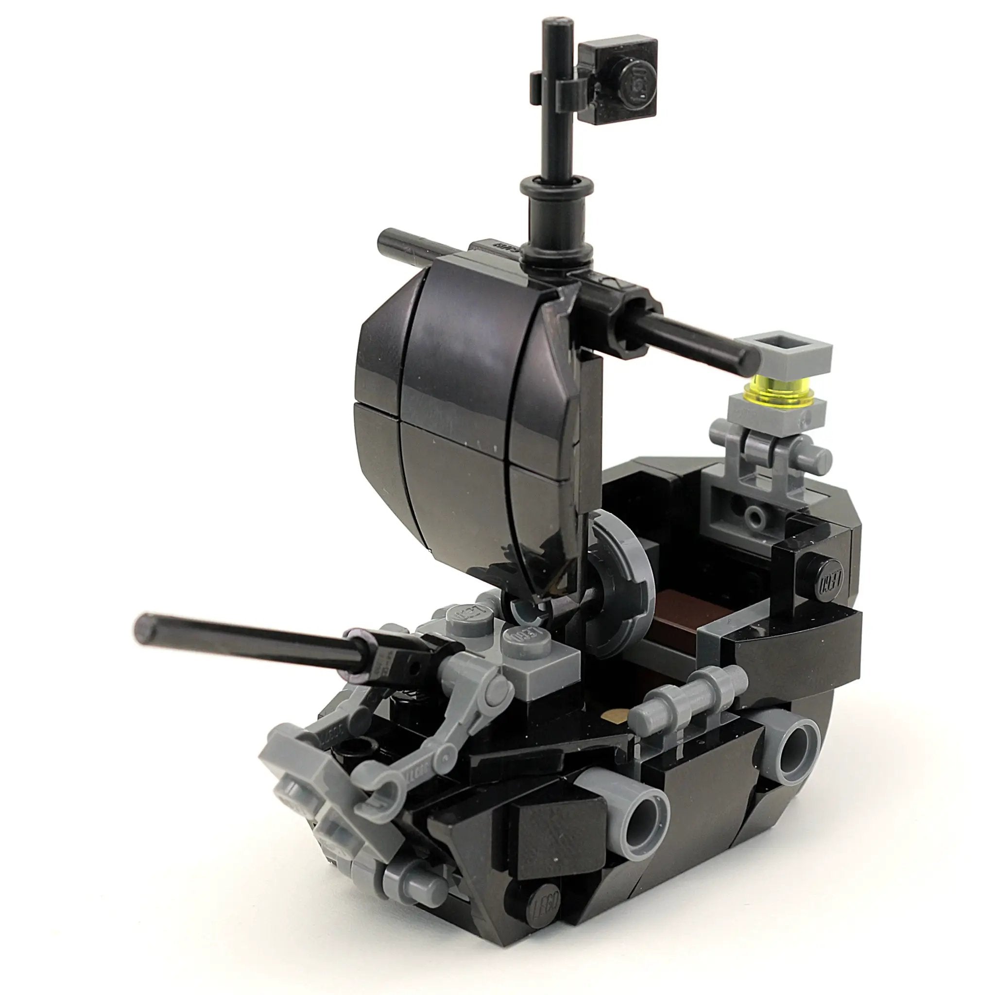 Mini black pearl pirate ship made of LEGO bricks by B3 Customs, detailed model showcasing sails, hull, and pirate-themed design.