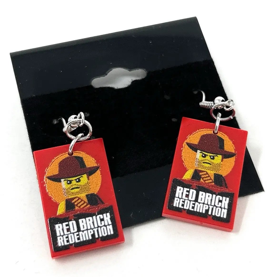 Red brick Redemption video gaming earrings made from LEGO parts by B3 Customs, featuring detailed LEGO brick design.