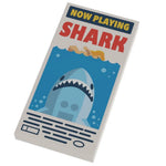 Custom LEGO Jaws movie poster featuring Shark Now Playing design on a 2x4 tile by B3 Customs.