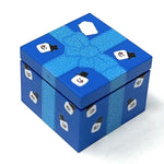 Blue snowman Christmas present printed 2x2 tile from B3 Customs, featuring festive holiday design on ceramic brick tile.
