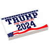 Custom LEGO Trump 2024 election campaign sign made with LEGO bricks, featuring bold red, white, and blue colors on a 2x3 tile.