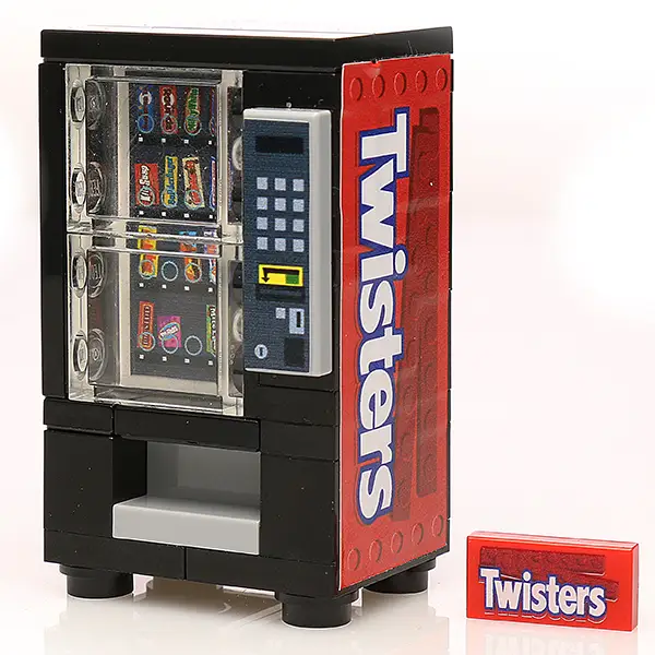 B3 Customs Twisters soda vending machine with Twizzlers candy in front, showcasing colorful candy packaging and vending display