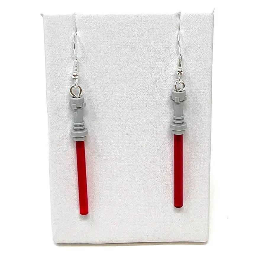 Star Wars Lightsaber earrings made from LEGO bricks by B3 Customs, featuring colorful, detailed lightsaber blade designs.