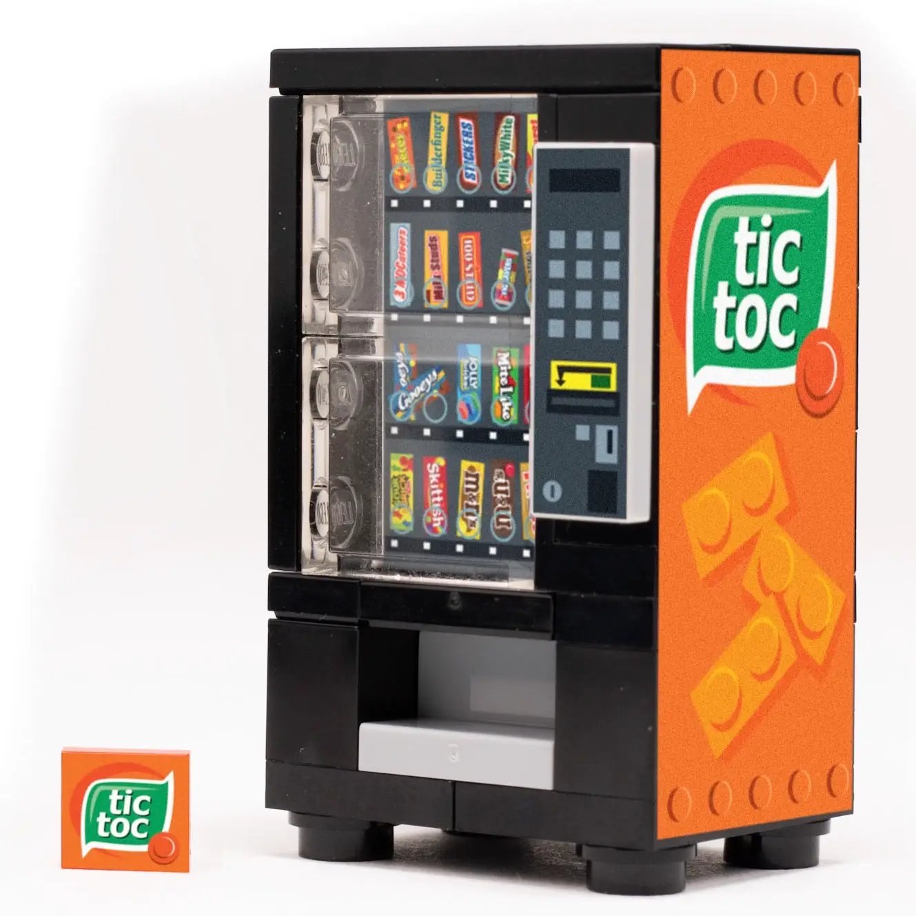 LEGO kit of a Tic Toc B3 Customs Candy Vending Machine, detailed construction set with colorful LEGO bricks and miniature vending features.