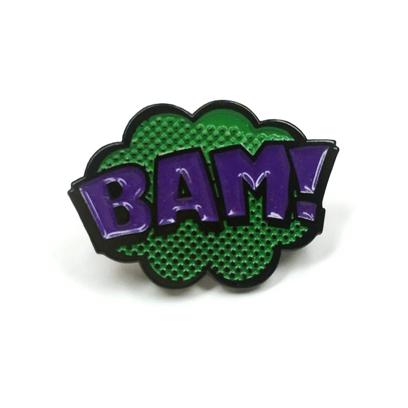 Kolorspun BAM! Pop Art enamel pin featuring bold, colorful comic-style design on a white background.
