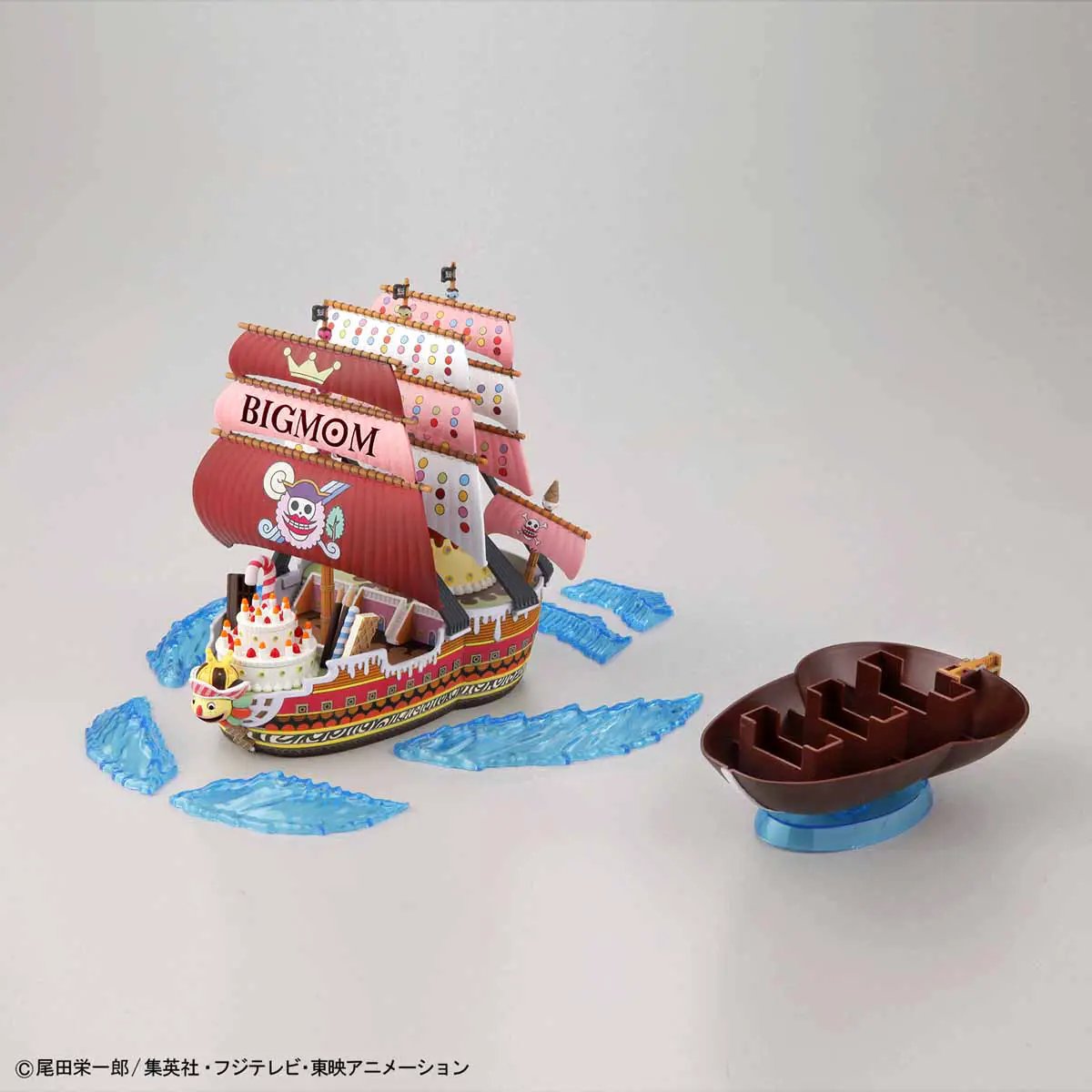 One Piece Queen Mama Chanter Grand Ship Model Kit by THE MIGHTY HOBBY SHOP, detailed ship model with sails and intricate design.