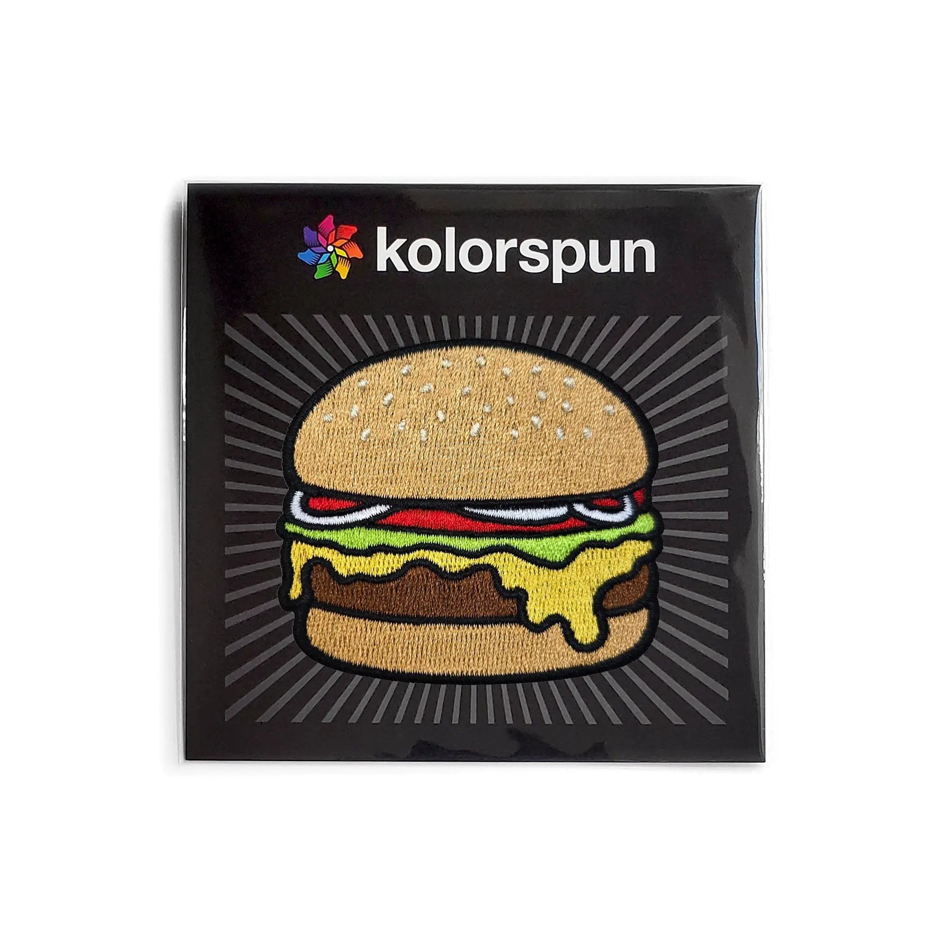 Kolorspun cheeseburger patch with embroidered details, designed for clothing or accessories, showcasing a classic burger design.