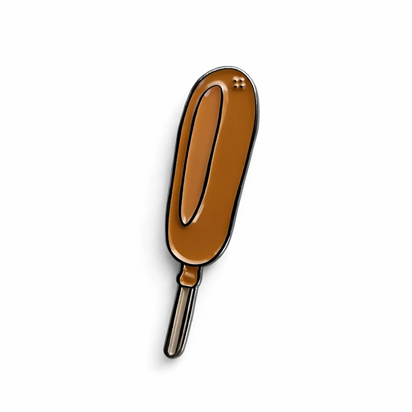 Kolorspun Corn Dog enamel pin featuring a colorful, detailed corn dog design on a pin backing.