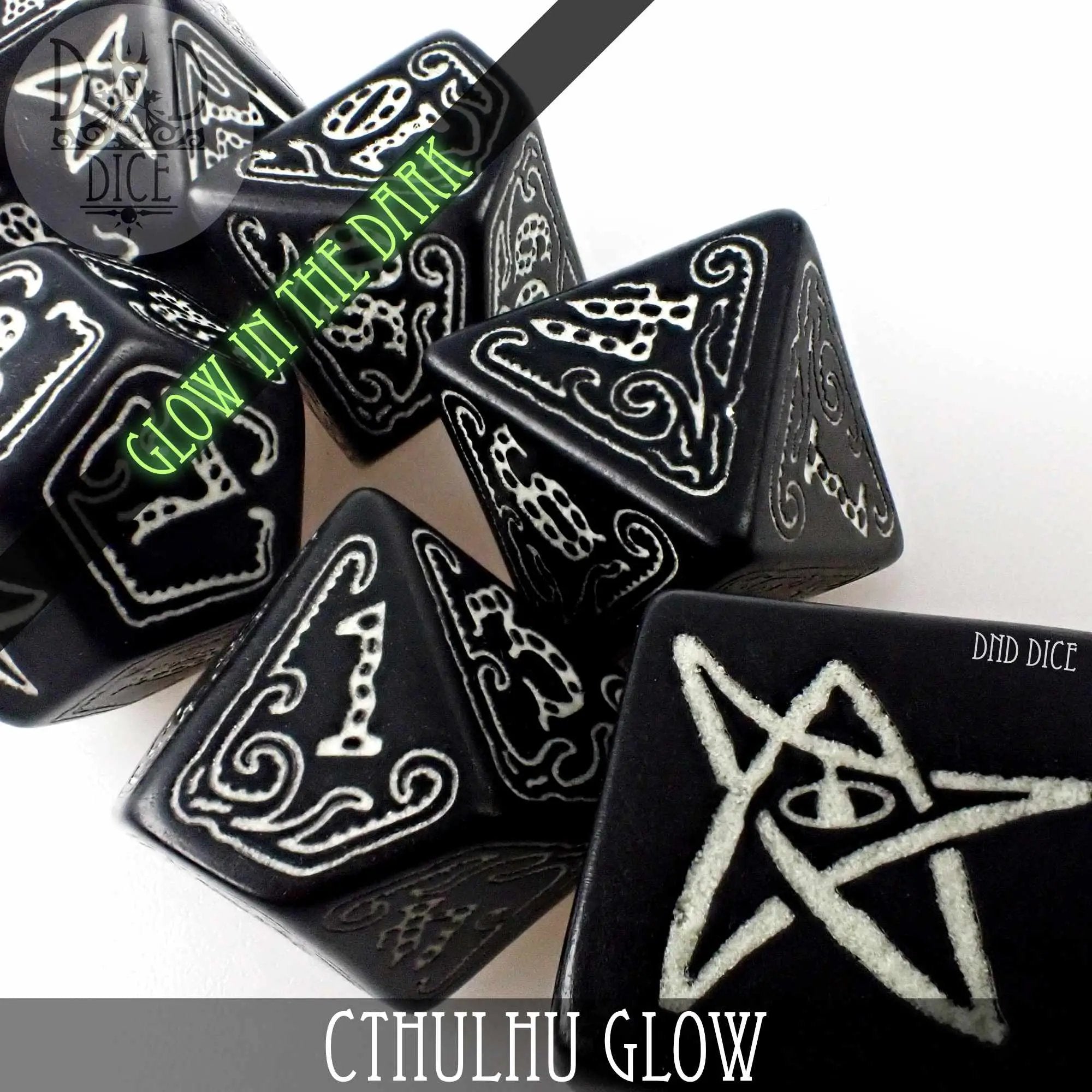 Glow in the dark Cthulhu-themed dice set with multiple polyhedral dice for tabletop gaming, featuring intricate design and luminous details.