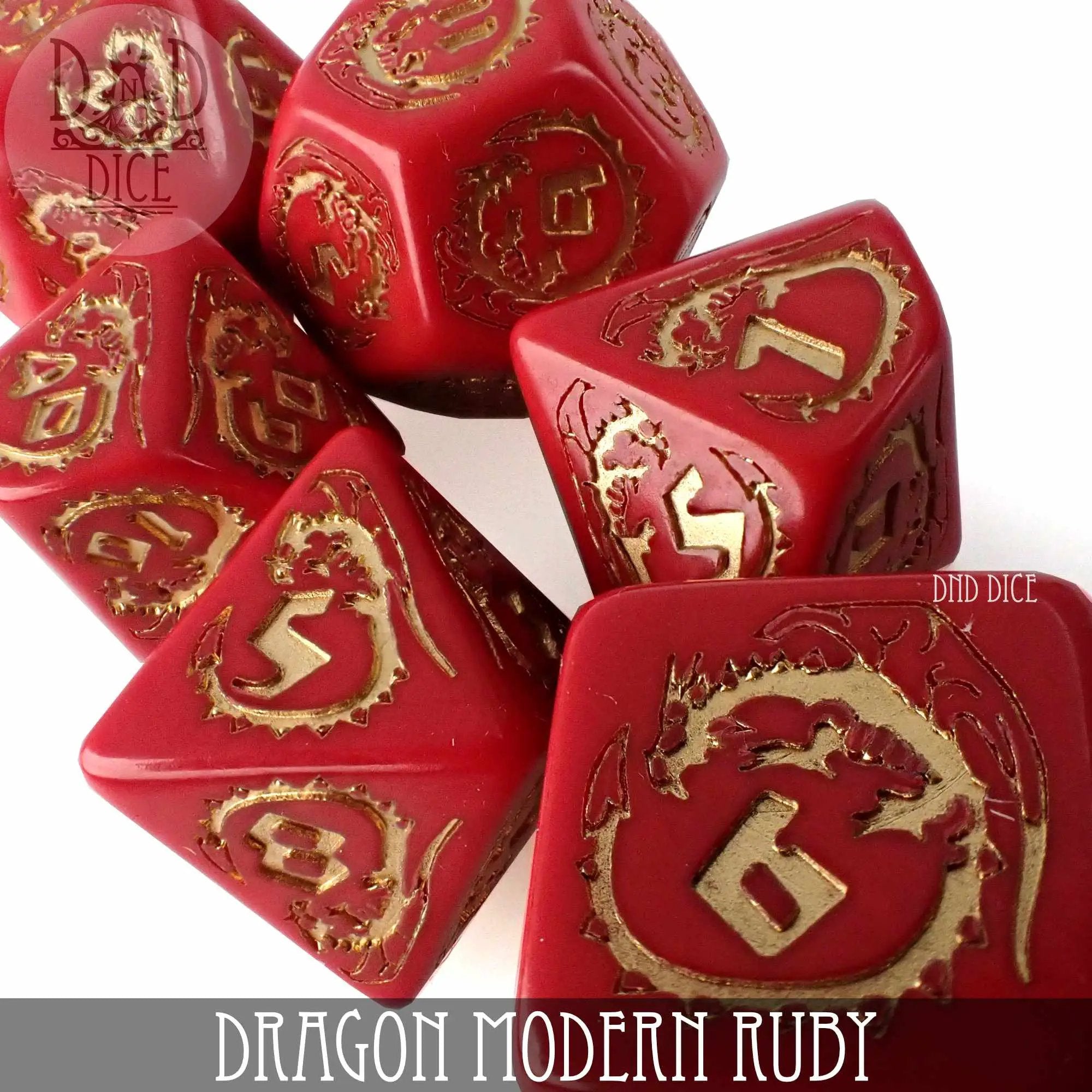 Modern ruby-colored Dragon dice set featuring multiple polyhedral dice for tabletop gaming, from DNDDICE.COM.