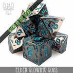 Metal Elder Glowing Gods dice set from DNDDICE.COM, featuring glowing, detailed design for tabletop gaming and role-playing games.