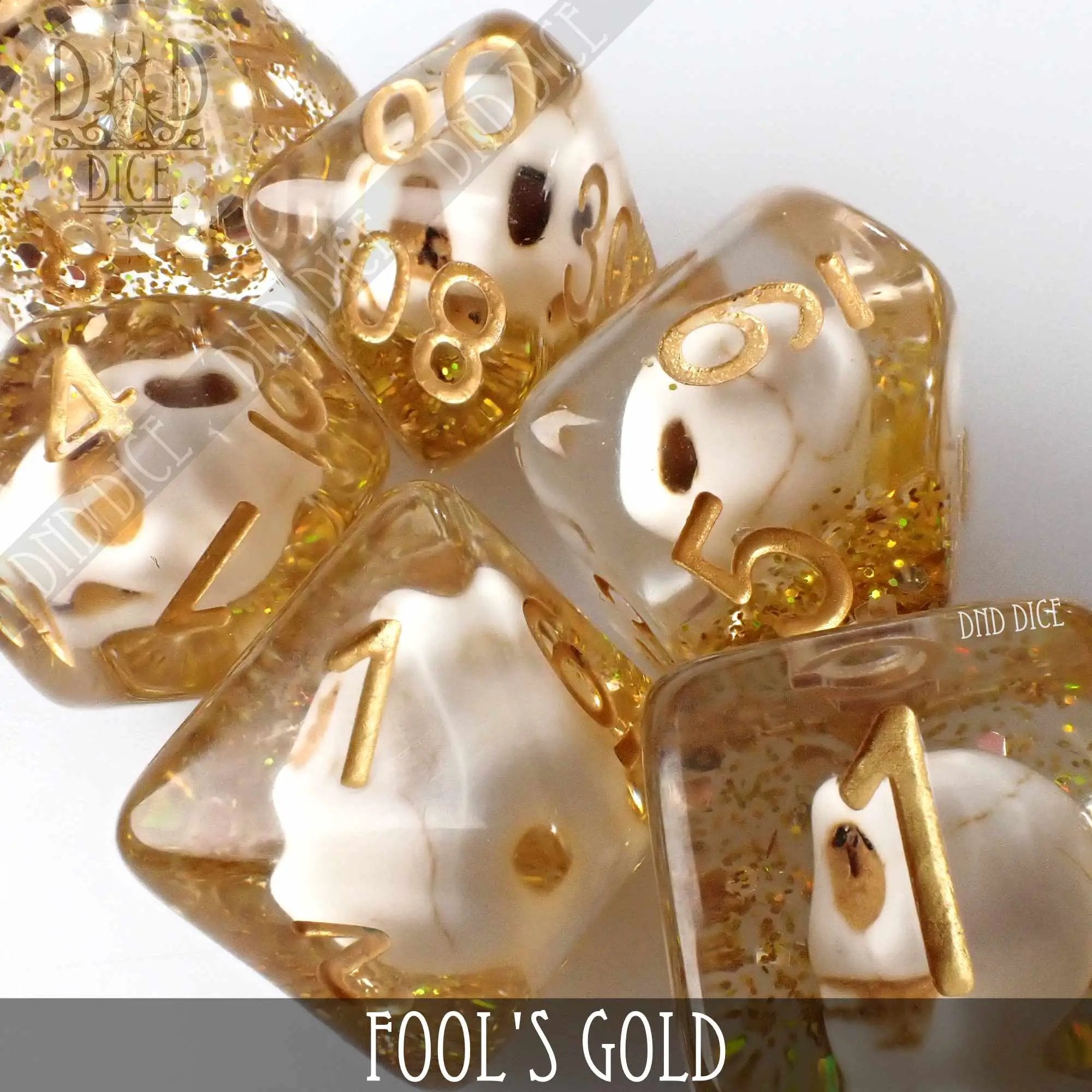 Fool's Gold dice set by DNDDICE.COM with shiny, gold-colored six-sided dice for tabletop games and role-playing adventures.