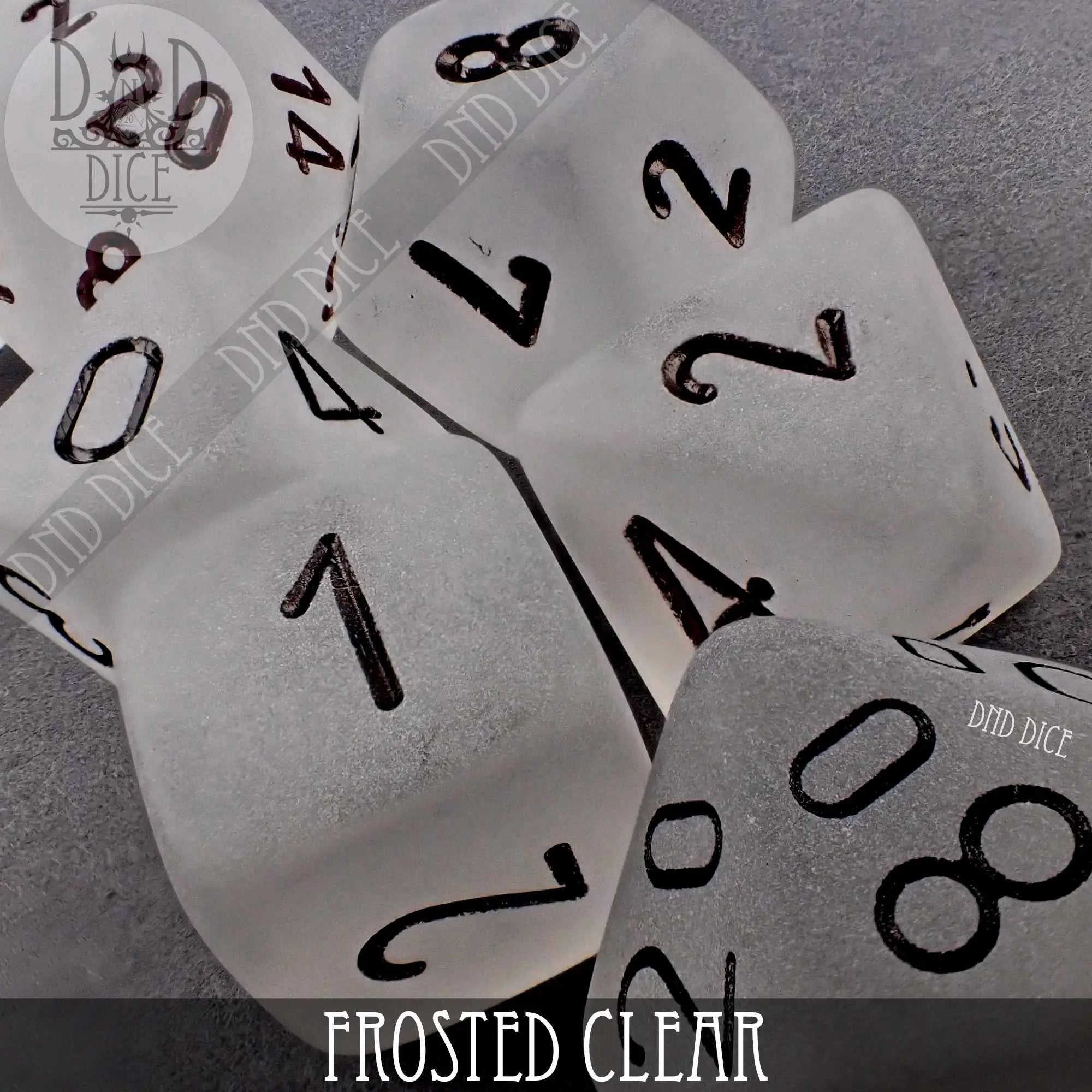 Frosted clear dice set for tabletop games, featuring multiple polyhedral dice from DNDDICE.COM with a translucent appearance.
