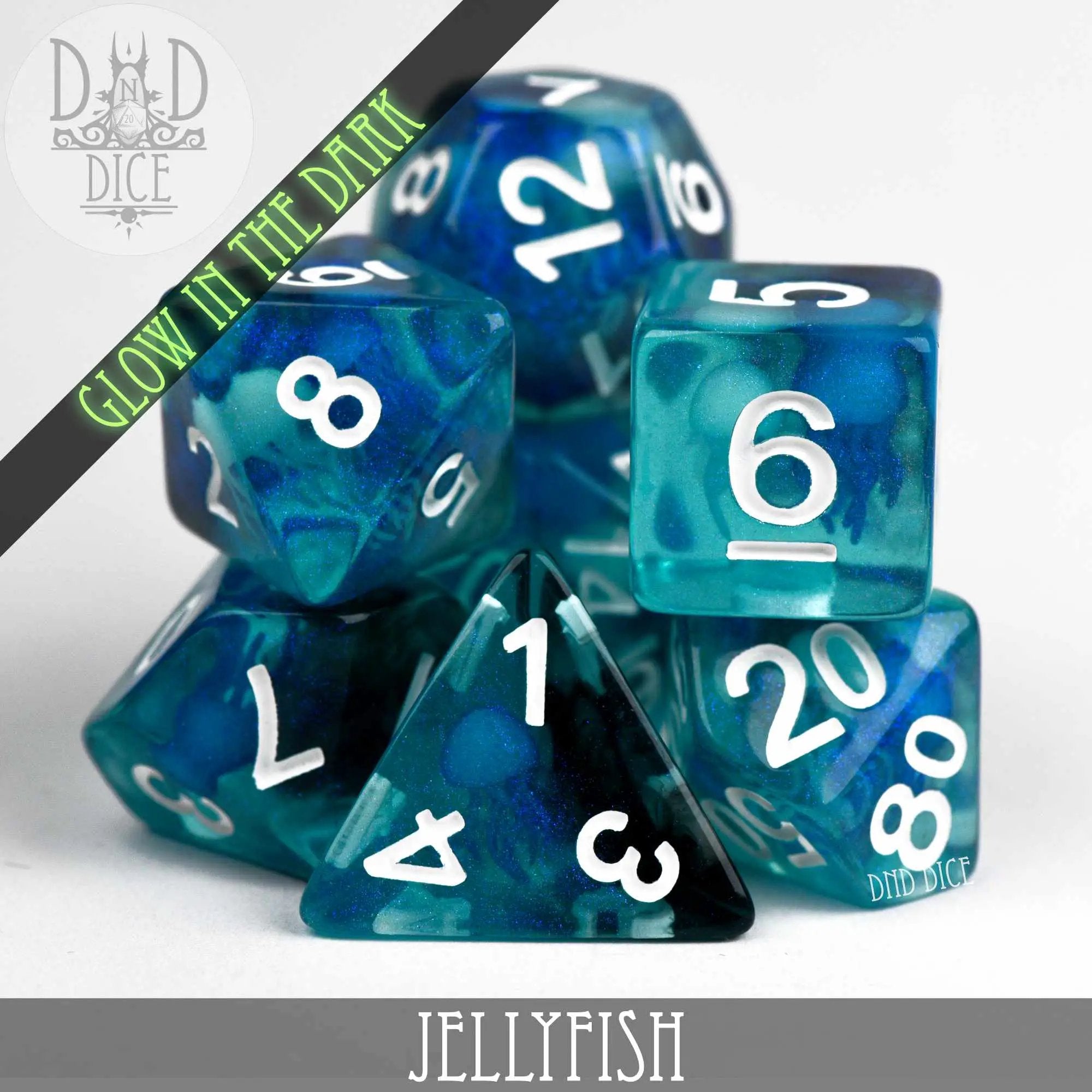 Glow-in-the-dark jellyfish dice set from DNDDICE.COM featuring colorful, translucent polyhedral dice for tabletop gaming.