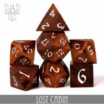 Wooden dice set with a gift box from Lost Cabin by DNDDICE.COM, featuring natural wood finish and six-sided dice for tabletop gaming.
