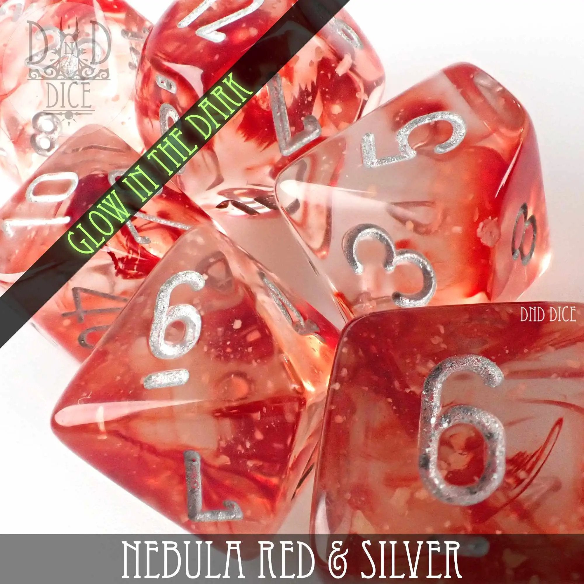 Red and silver glow-in-the-dark dice set from DNDDICE.COM featuring various polyhedral dice for tabletop games.