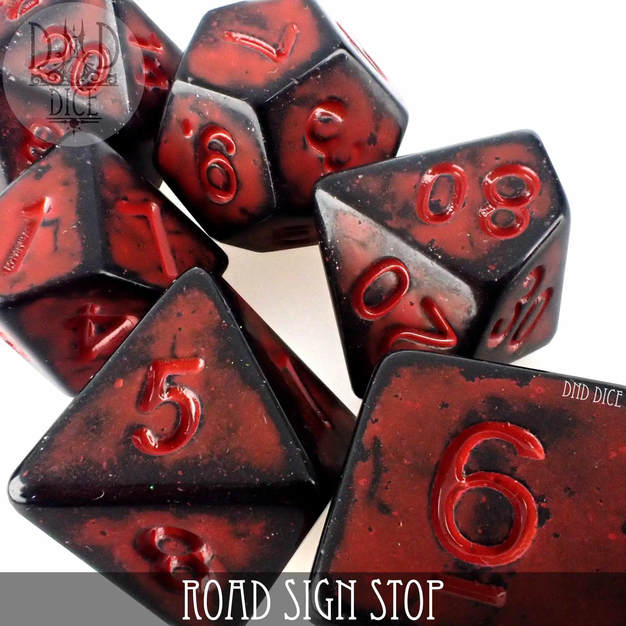 Red stop sign dice from DNDDICE.COM, part of the Road Sign Stop Dice Set, featuring bright red signs with white lettering.