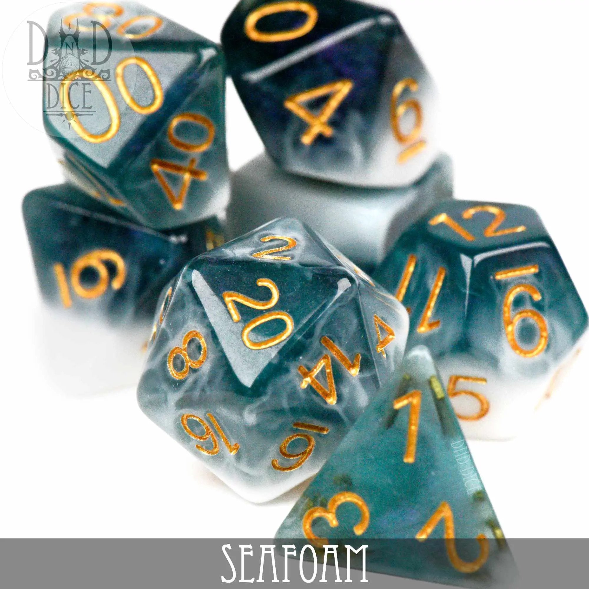 Seafoam-colored dice set from DNDDICE.COM, featuring various polyhedral dice for tabletop gaming and role-playing games.