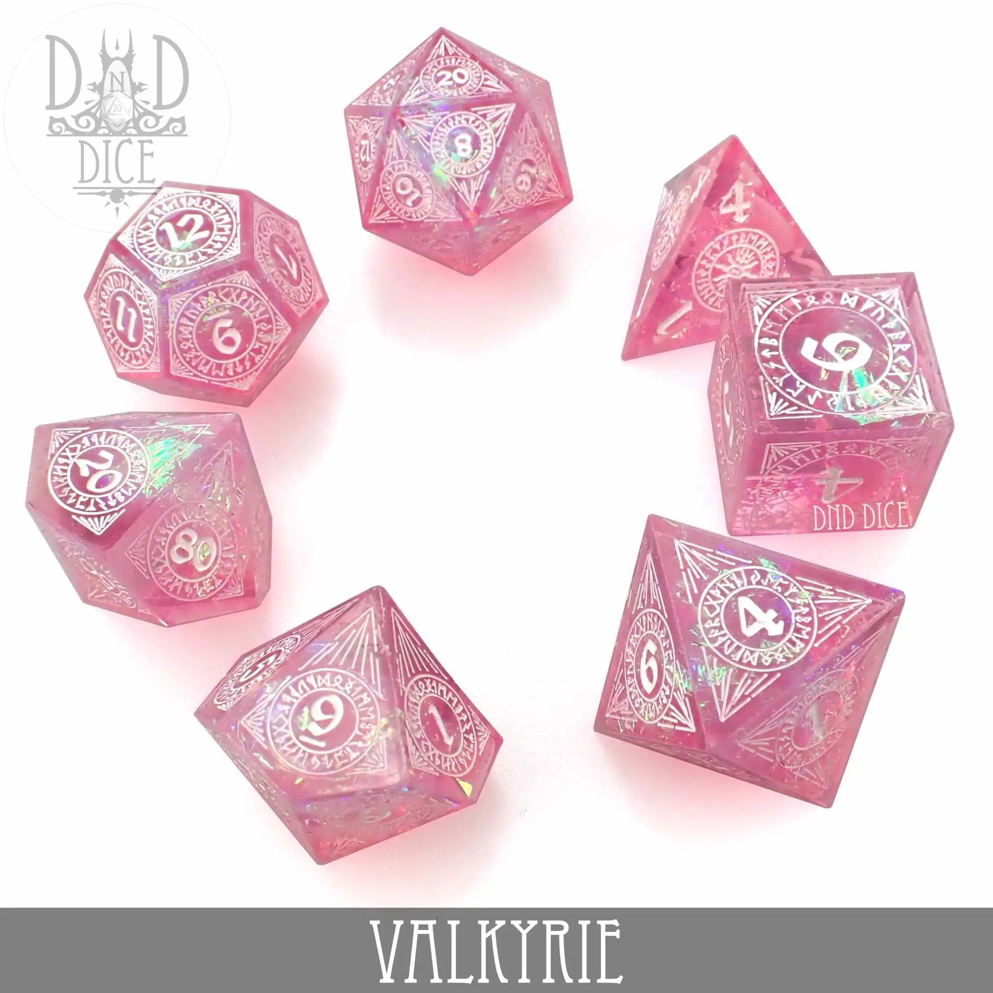 Handmade Valkyrie dice set from DNDDICE.COM featuring intricately carved metal gaming dice on a dark background.