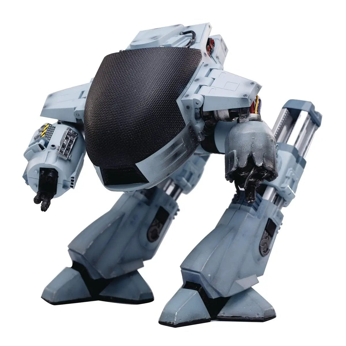 Battle-damaged ED-209 RoboCop action figure in 1:18 scale, featuring detailed damage and futuristic robotic design.