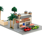 Detailed image of THE MIGHTY HOBBY SHOP Fast and the Furious Nano Scene Toretto's Cafe Diorama Set featuring miniature cafe and street scene elements.