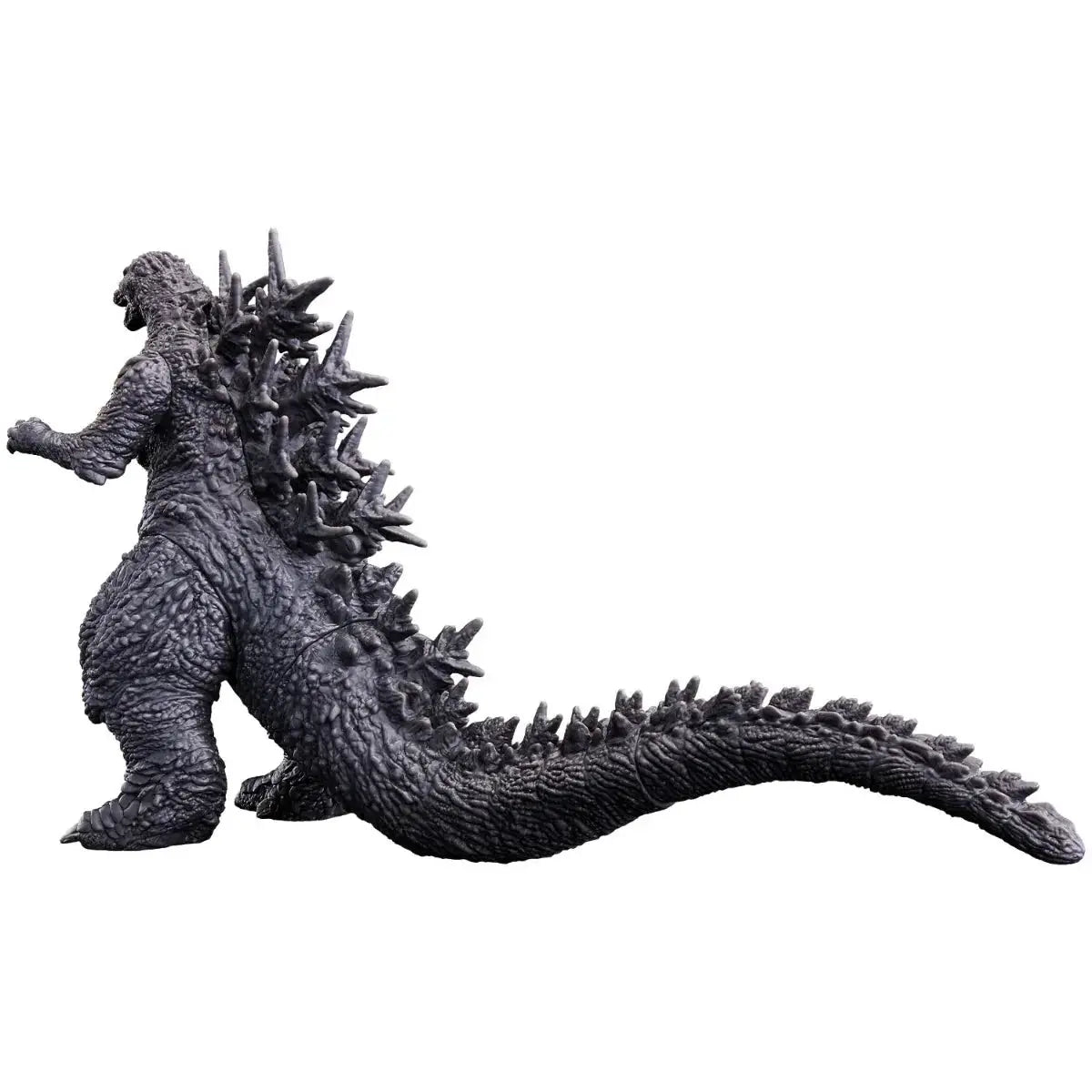 Back view of Bandai Movie Monster Series 2 Godzilla 2023 figure, showcasing detailed scales and powerful tail.