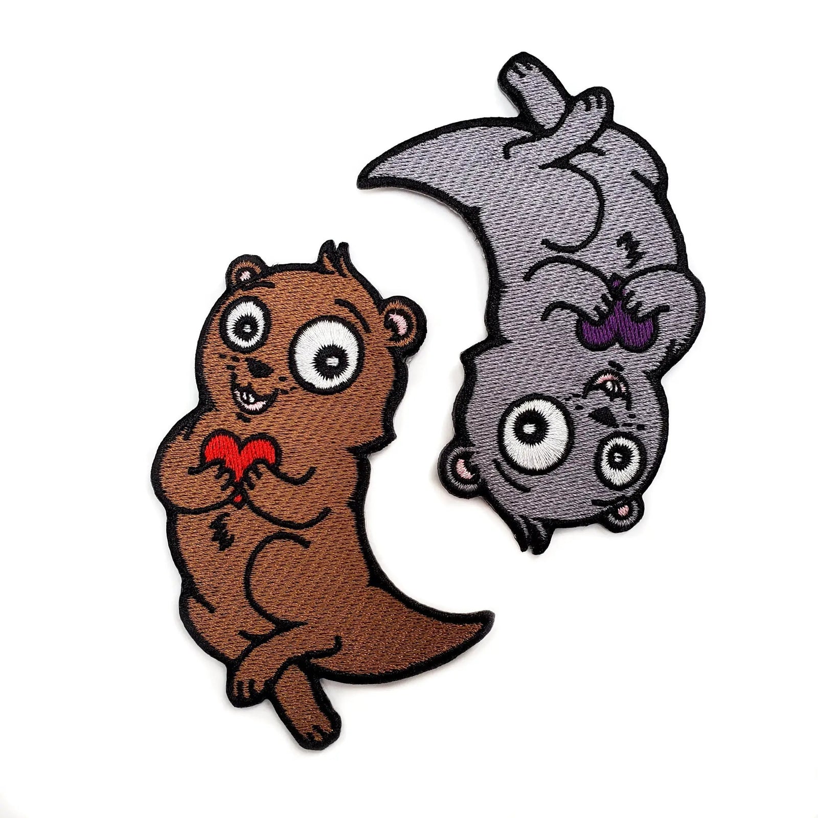 Kolorspun Significant Otters iron-on patch with colorful otter design on fabric background